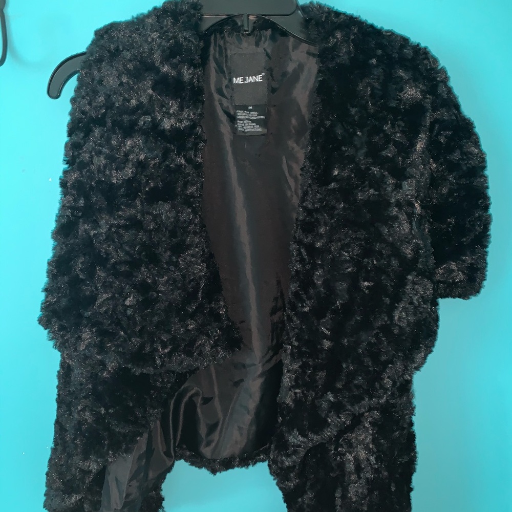 black faux fur vest